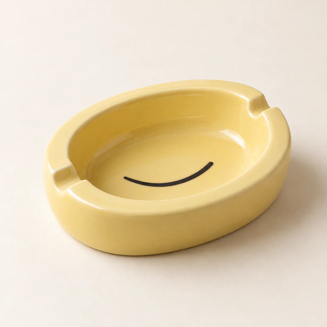 Wink Dish ashtray in Butter / Ink